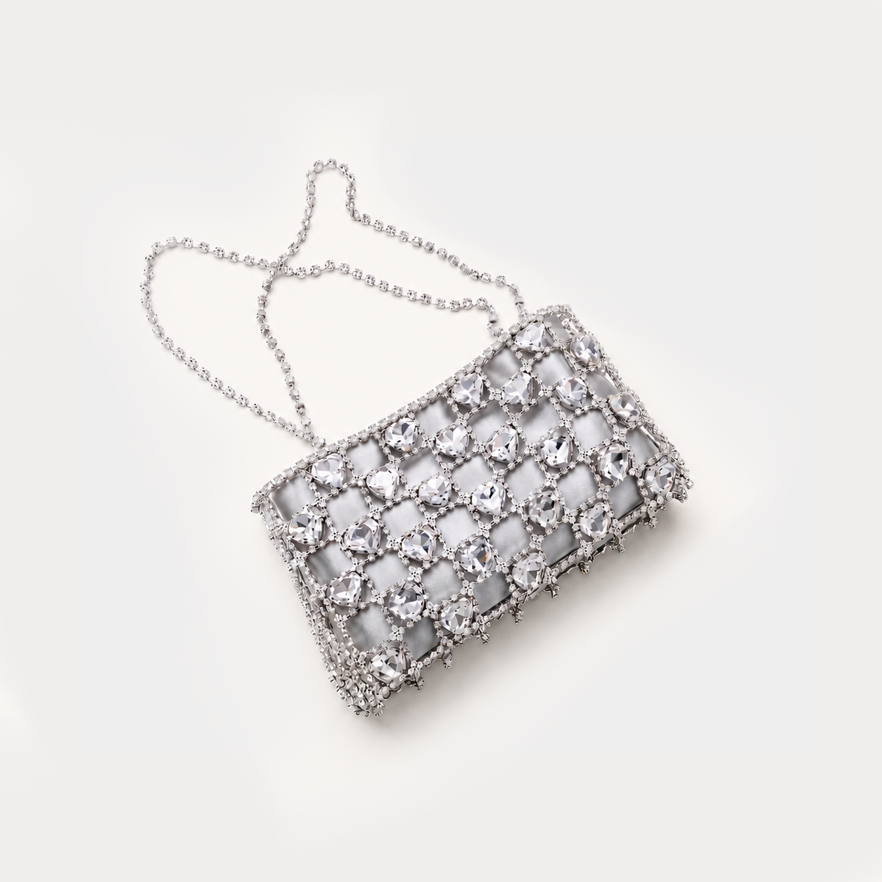 Giarité Ajour heart-cut crystal detail on see-through cage bag
