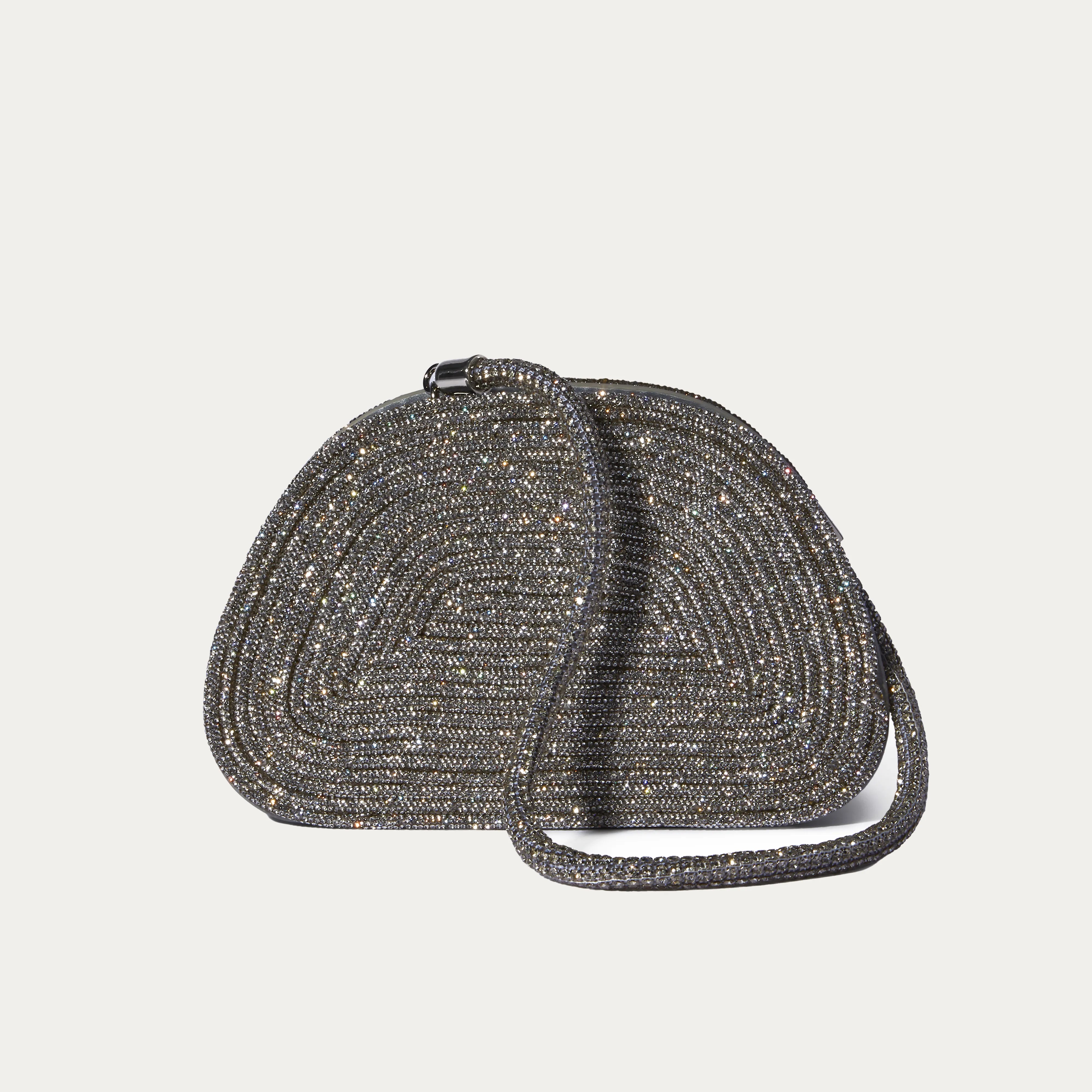 A sparkling silver Giarité Leonis rhinestone clutch handbag with a curved, structured shape and a delicate strap, designed for evening wear